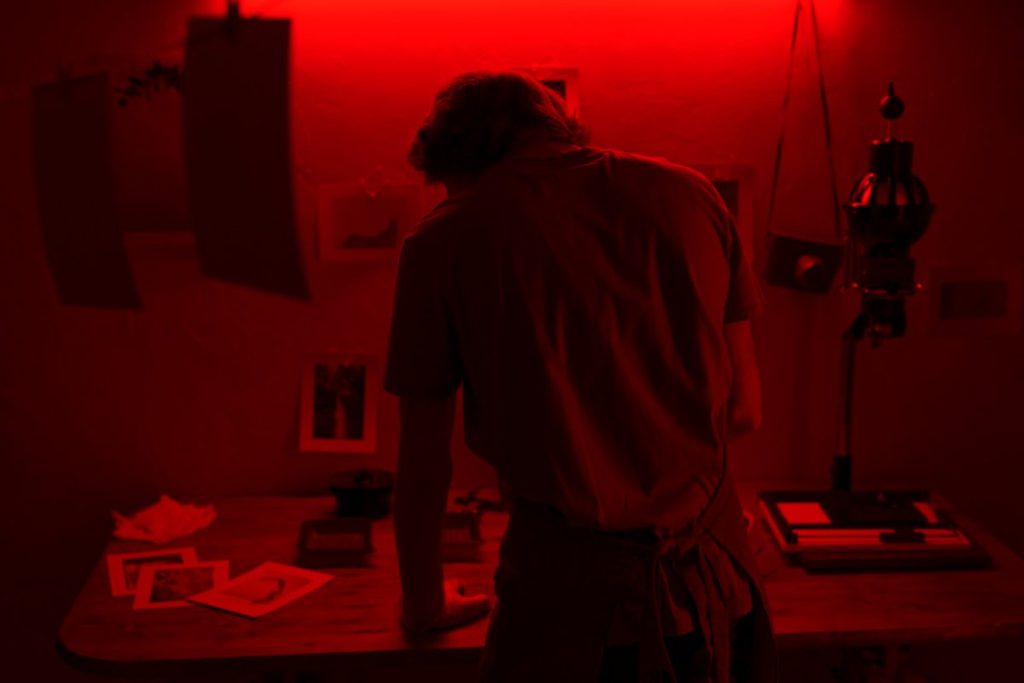 Man developing photos | Image Source: Magnific